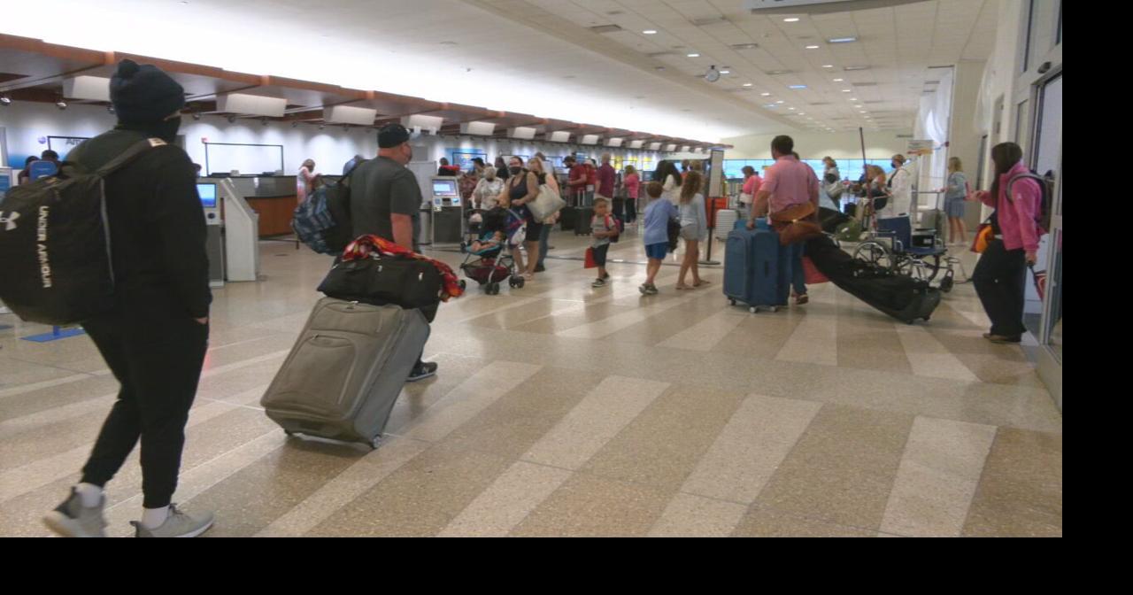 Departing travelers face long lines at Louisville airport