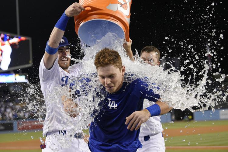Will Smith is doused by Cody Bellinger