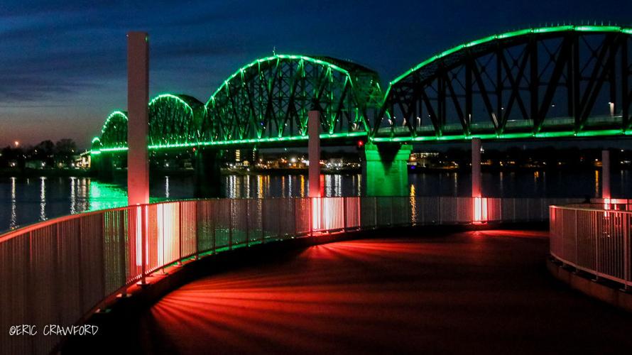 Pedestrian bridge lit up green