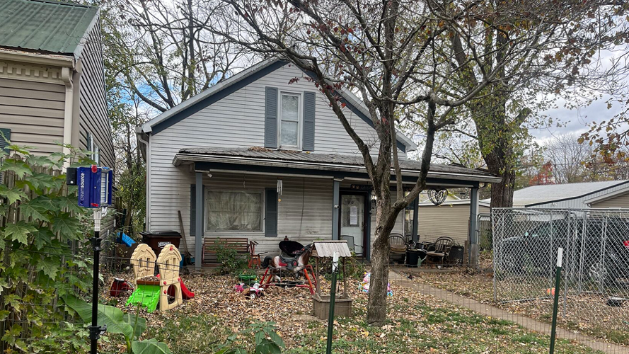 Carrollton home where 2-year-old was found in a cage