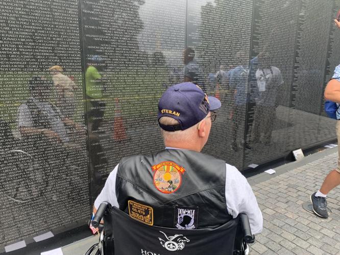 Honor Flight Bluegrass veteran at the Vietnam Memorial on Wednesday, Sept. 7, 2022