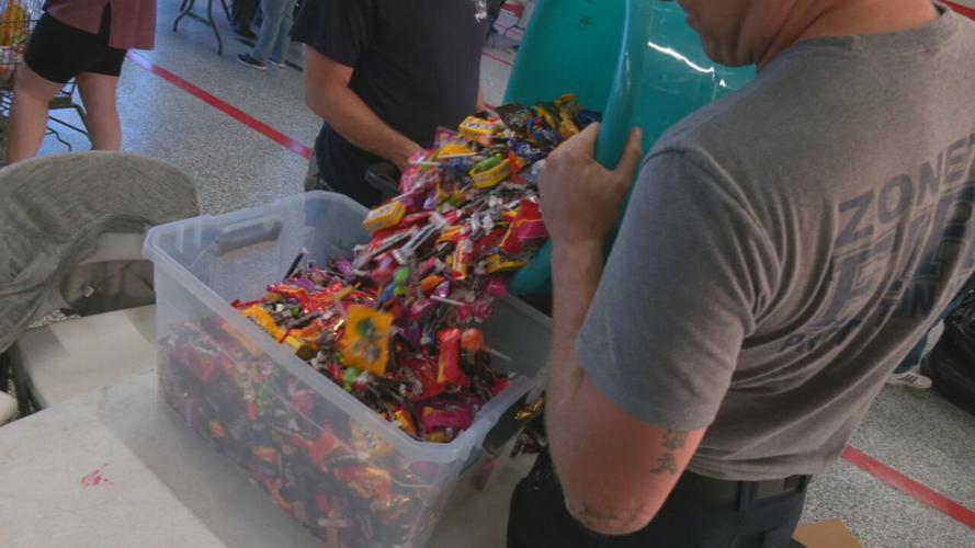 Volunteers pack candy bags for Zoneton Fire Halloween 2021 (3).jpeg