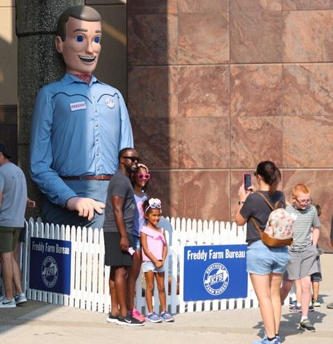 People pose for photo at Freddy Farm.JPG