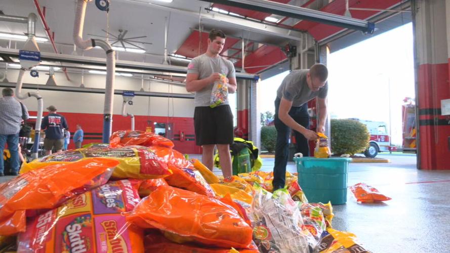 Volunteers pack candy bags for Zoneton Fire Halloween 2021 (2).jpeg