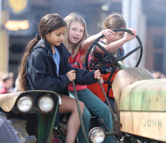 Children play on tractor