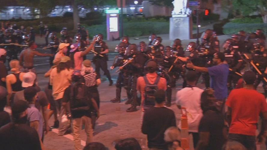 Protesters clash with police