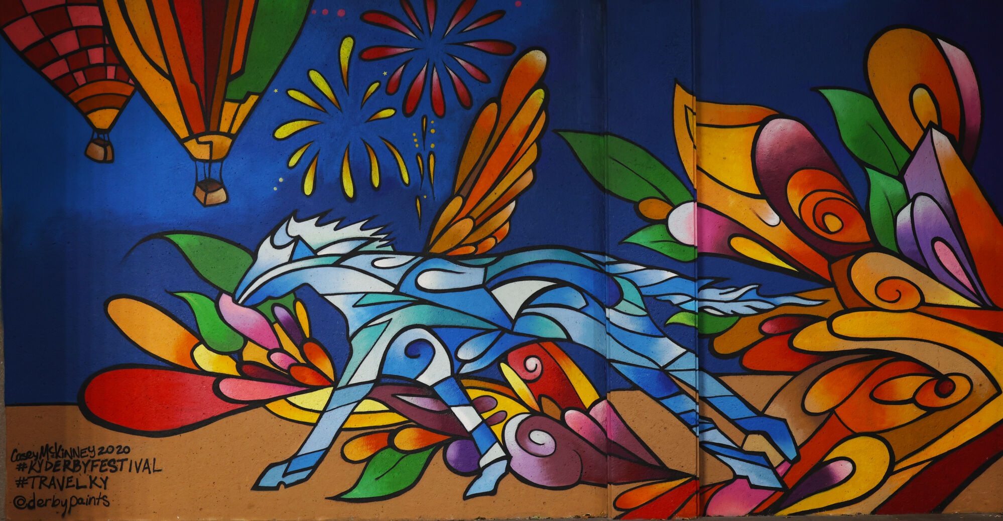 Colorful horse mural in Louisville.JPG