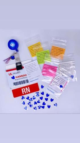 Louisville health care workers make blue heart stickers to celebrate 'healthcare heroes'