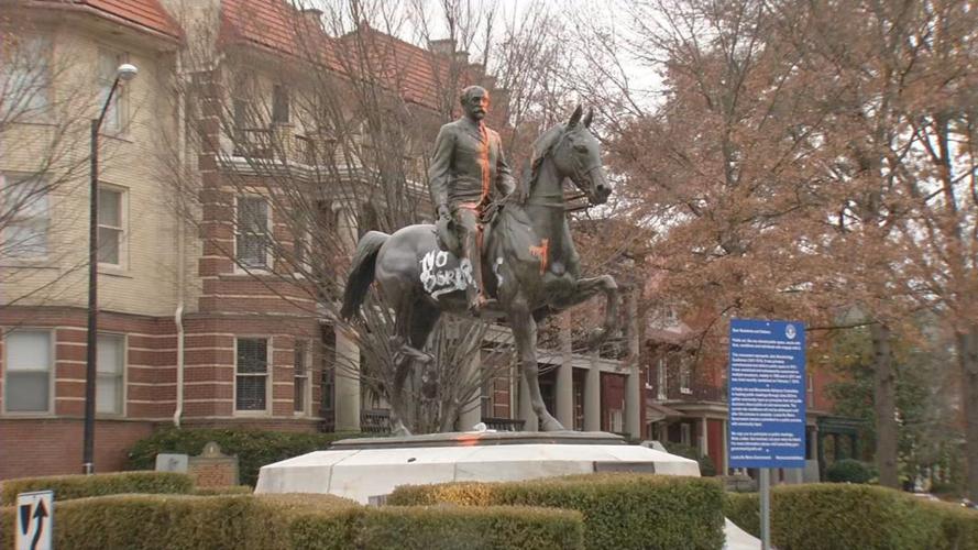 Castleman Statue Orange Paint