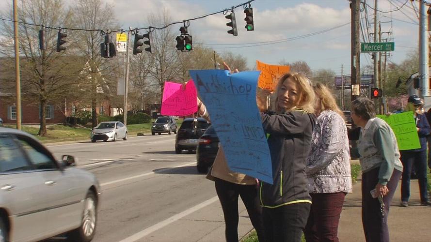 Signs at rally for LMPD officer on Poplar Level.jpeg