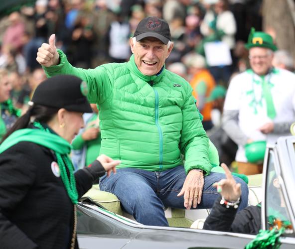 Man gives thumbs up at parade
