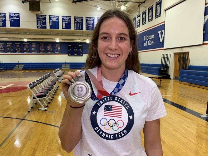 Brooke Forde with Olympic medal