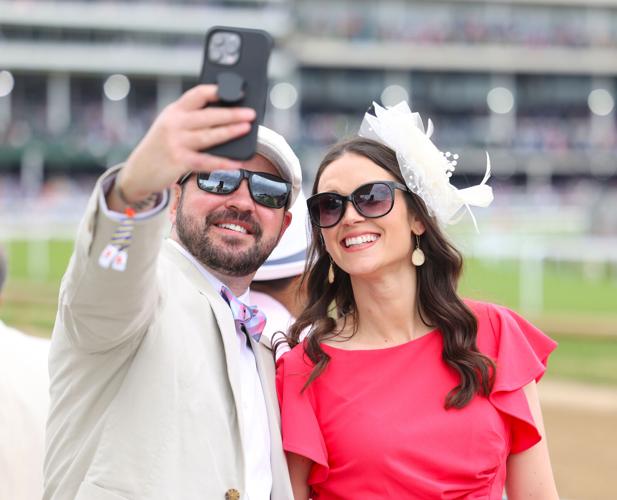 Man holds up phone for selfie.JPG