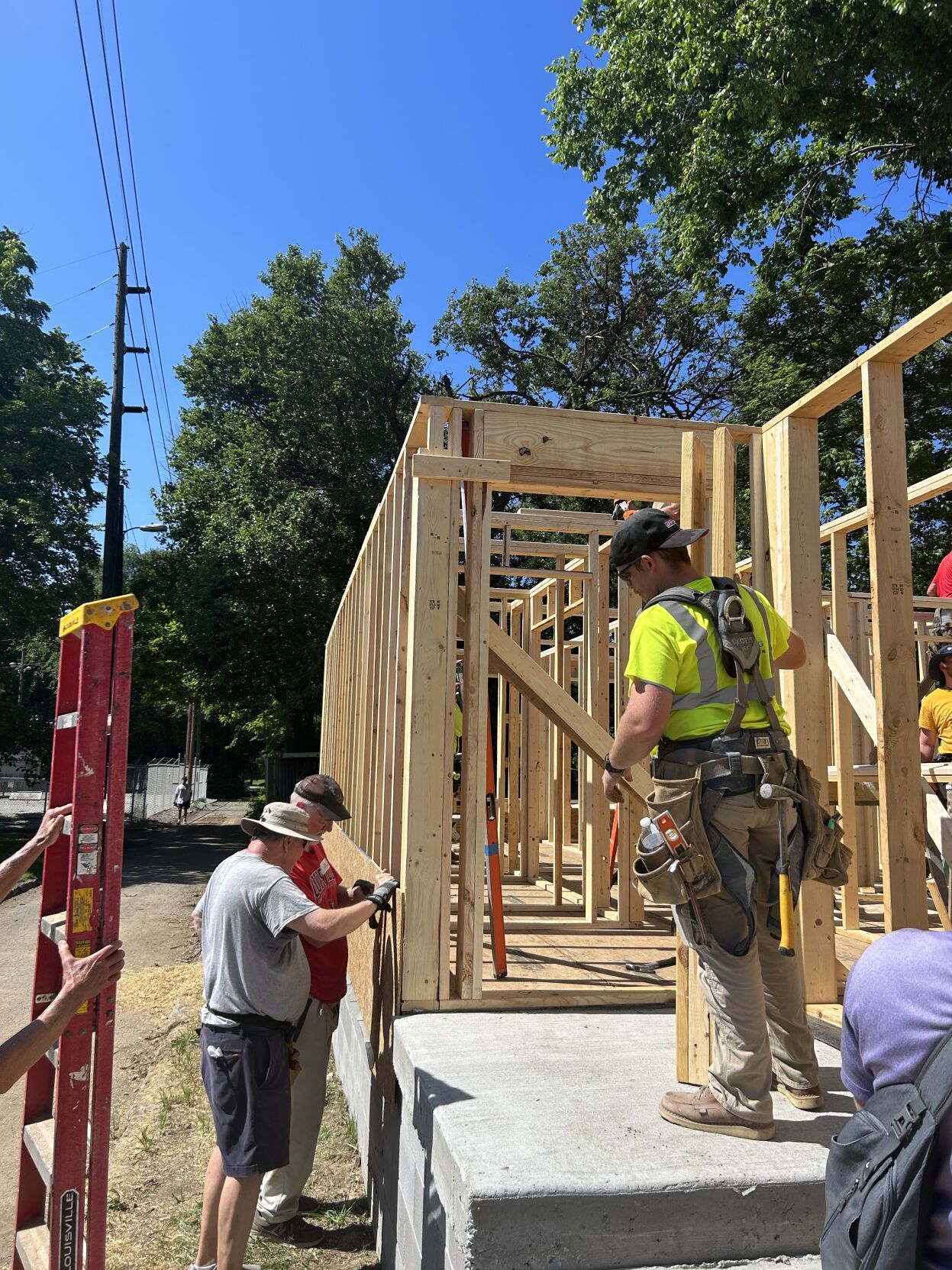 Holy high five builds house