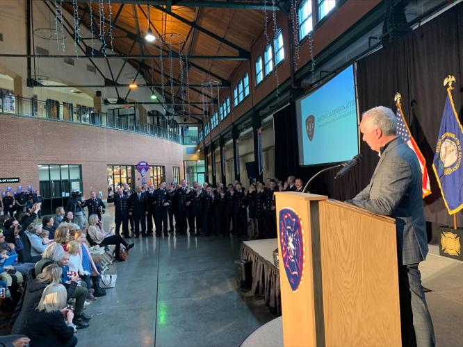 Louisville firefighters at promotion ceremony