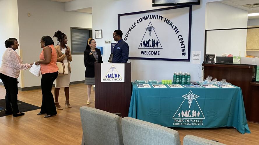 Speakers at Park DuValle Community Health Center