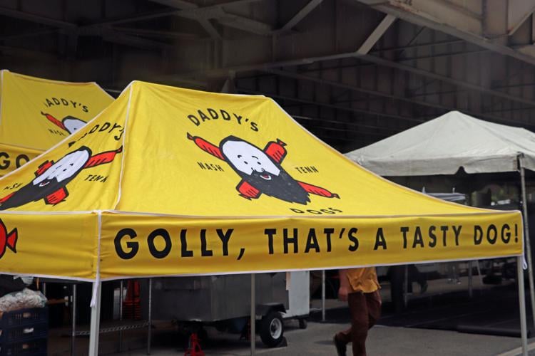 Crews set up booths along the Ohio River one day before Thunder Over Louisville 2023