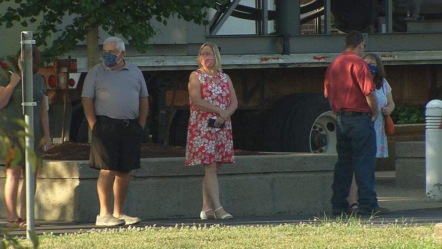 Parents wait in line for southern Indiana high school graduation