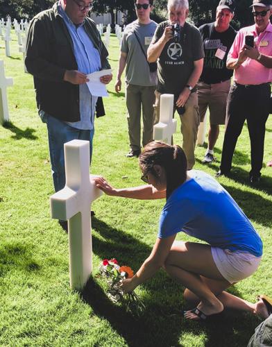 Nicole Finch visits grave on Band of brothers tour.jpg