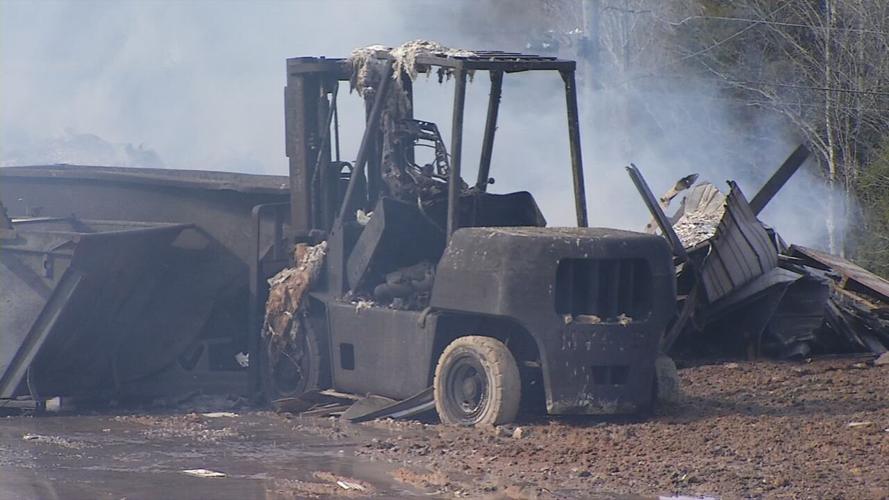 Aftermath of fire at Wholesale Hardwood Interiors in Campbellsville
