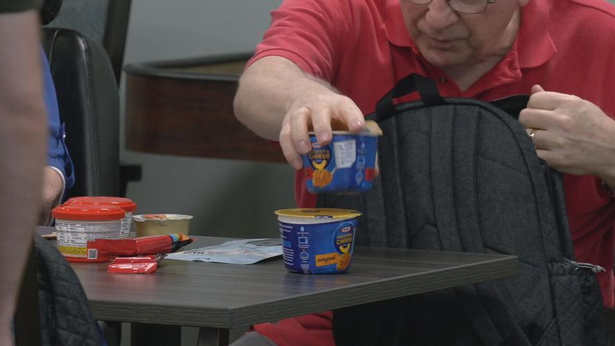 SENIORS STUFFING BACKPACKS FOR KIDS.jpeg