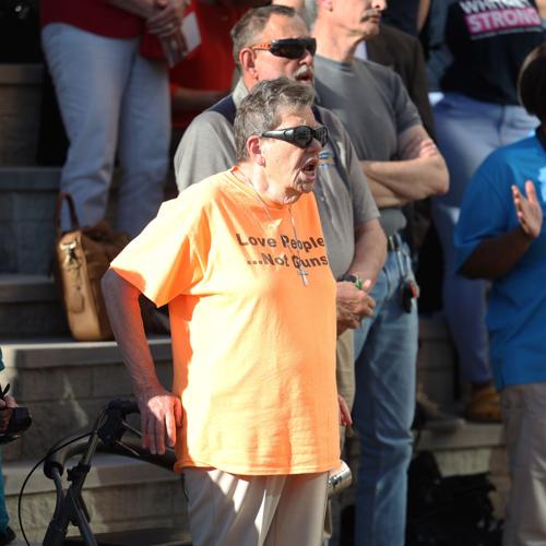 Woman yells during vigil.JPG