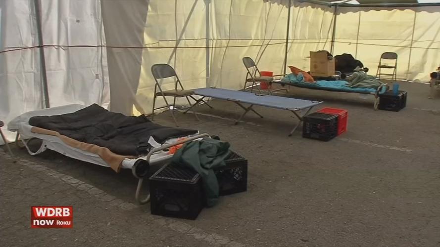 Jeffersonville homeless tent interior cots.jpg