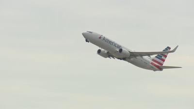 American Airlines jet in flight