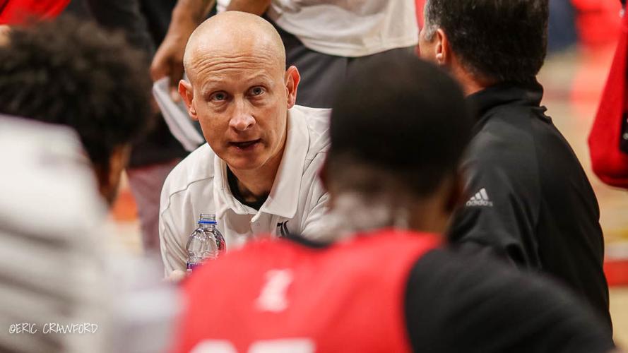 Chris Mack in the huddle
