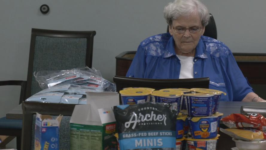 SENIORS STUFFING BACKPACKS FOR KIDS.jpeg