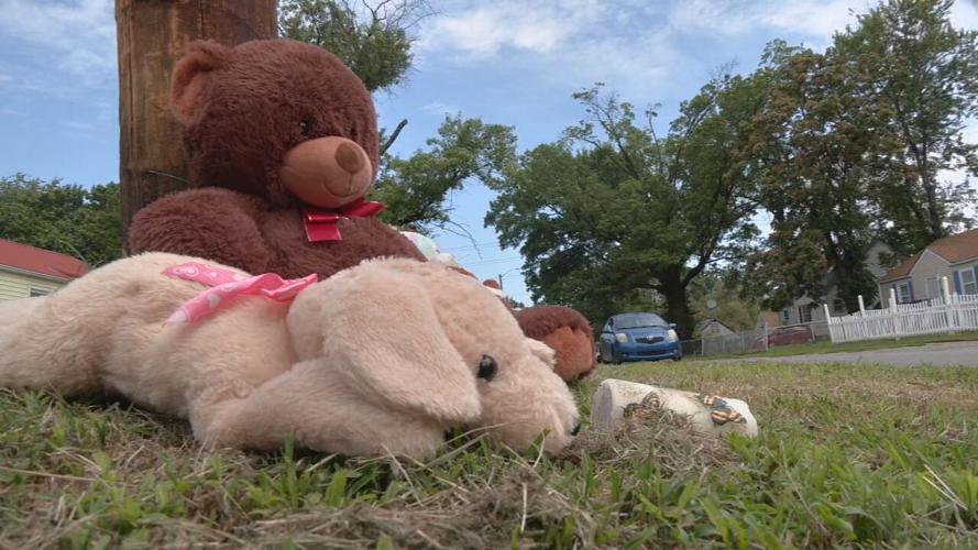Memorial set up at bus stop shooting site in Park Duvalle 8-27-26
