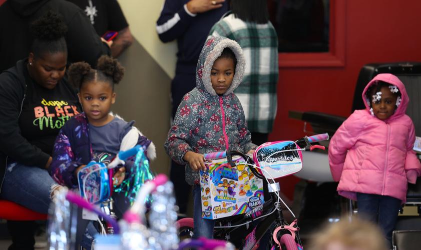 Kentucky College of Barbering hosts toy giveaway