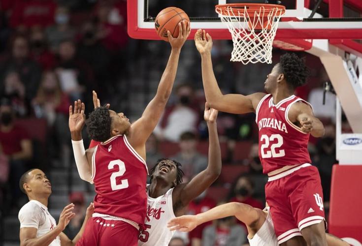 Indiana's Michael Durr and Jordan Geronimo reach for a rebound.jpeg