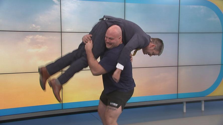 Mitchell Hooper deadlifts Chris Sutter