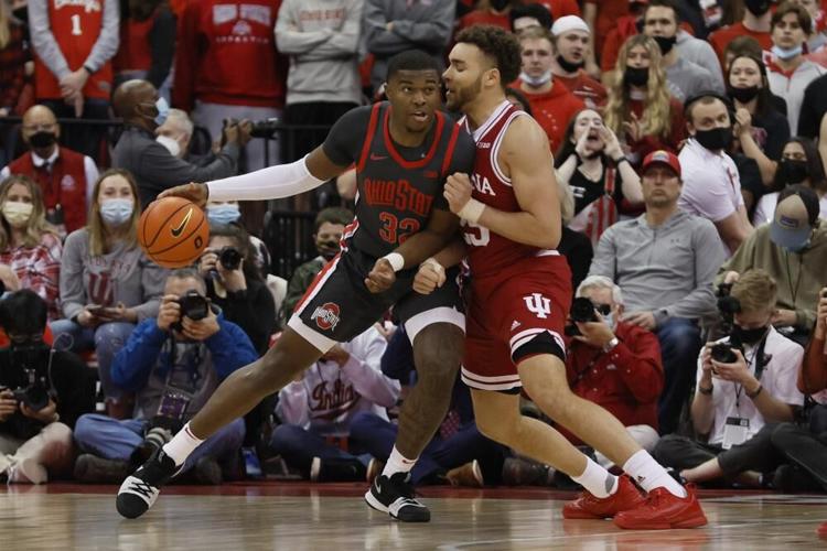 Ohio State's EJ Liddell posts up against Indiana's Race Thompson.jpeg