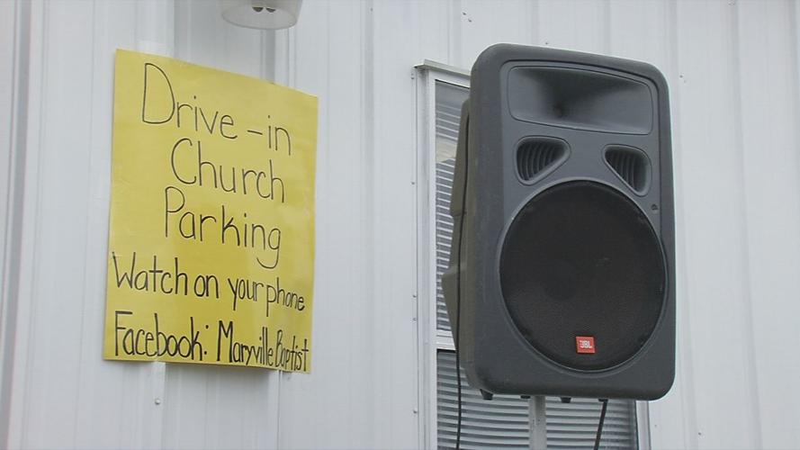 Sign for drive-in church parking at Maryville Baptist Church