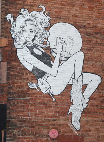 Cosmo girl with ball mural.JPG