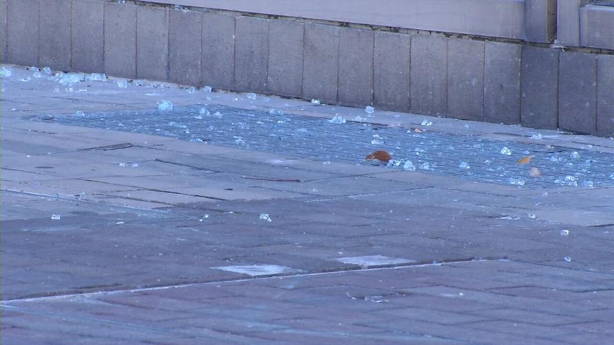 Brown & Williamson broken glass on ground