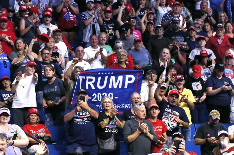 President Donald Trump supporters cheer Eric Trump, the son of President Donald Trump