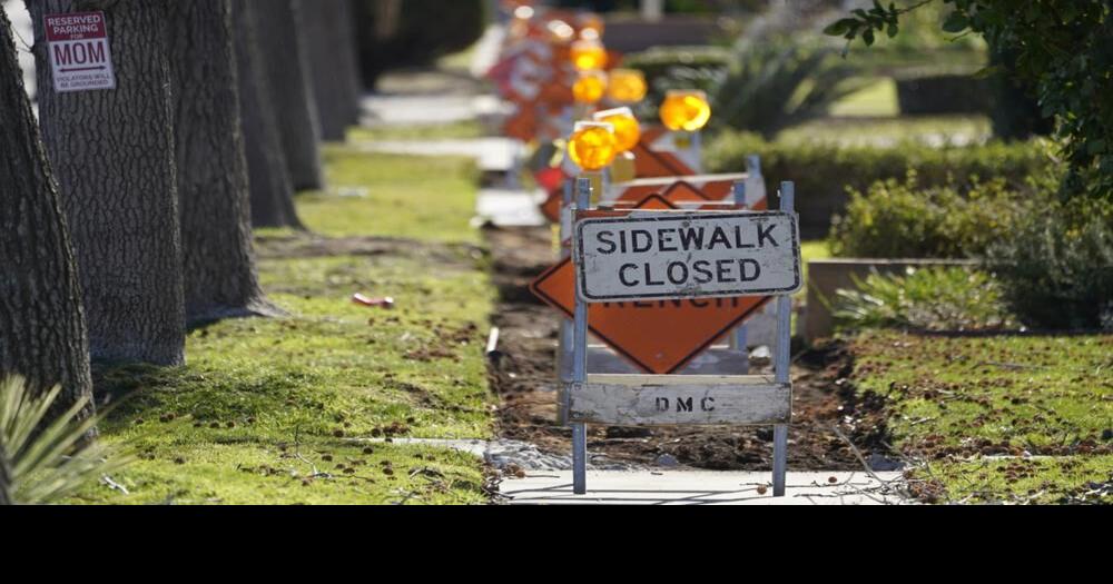 A sidewalk is closed as crews work on repairs in Upland, California.jpeg |  | wdrb.com->回答 2 件