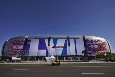 Workers prepare for NFL Super Bowl game.jpg