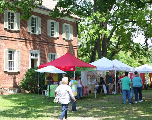 People walk at Gardeners Fair at Locust Grove.JPG