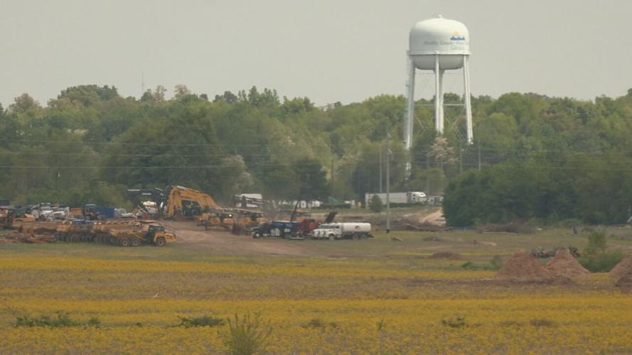 Crews stage for construction in Hardin County.