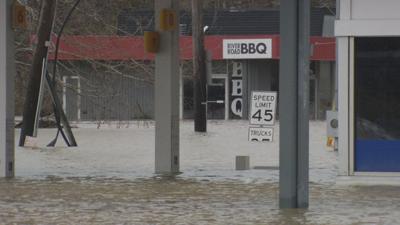 Owners of River Road businesses assess flood damage and begin to clean up
