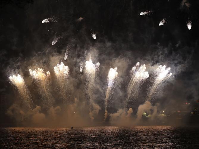 Fireworks fire off the bridge.JPG