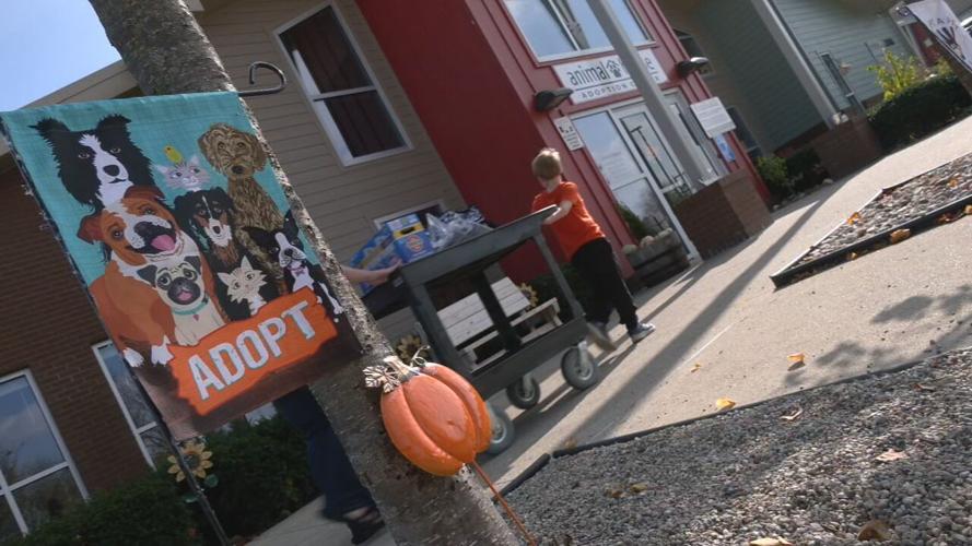 Aleric Crump with donations for animal shelter