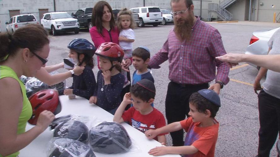 BIKE HELMET GIVEAWAY - WDRB - VIDEO 6-19-19 (9).jpg