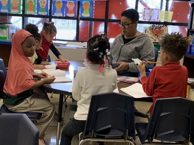 Young Elementary Ethel Martin reading.jpg