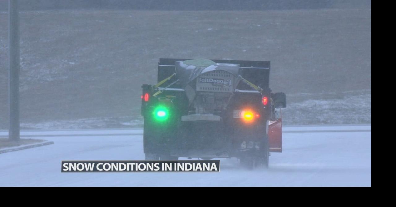 Officials in southern Indiana ask residents to stay off the roads as crews treat streets, roads