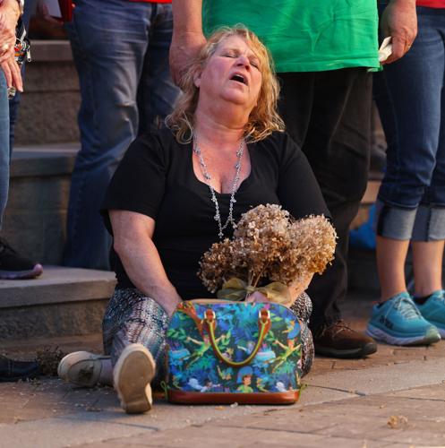 Womans sings Amazing Grace at Vigil.JPG